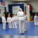 Class bowing to new yellow belt
